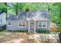 Aerial view of a charming house with landscaping at 1902 Canterbury St, Decatur, GA 30032