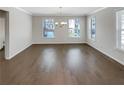 Bright dining room with hardwood floors and large windows at 2286 Foley Park St, Snellville, GA 30078