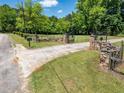 Private gated entrance with a long driveway to the house at 500 Cochran Rd, Covington, GA 30014