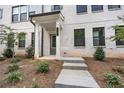 Front entrance with covered porch and steps at 2727 Harrison Dr, Lawrenceville, GA 30044