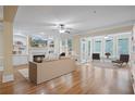 Spacious living room with hardwood floors, fireplace and built-in shelving at 4740 Legacy Cove Ln, Mableton, GA 30126