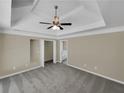 Spacious bedroom with high ceilings and ceiling fan at 421 Thornbush Trce, Lawrenceville, GA 30046