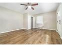 Spacious living room with neutral walls and vinyl plank flooring at 1743 Hollyhock Ter, Decatur, GA 30032