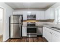 Updated kitchen with stainless steel appliances and granite countertops at 2069 Chicago Nw Ave, Atlanta, GA 30314