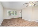 Bright living room with vinyl plank flooring and neutral walls at 2519 Brentwood Rd, Decatur, GA 30032