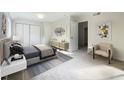 Main bedroom with double door closet and neutral decor at 2140 Fern Valley Sw Dr, Atlanta, GA 30331