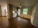 Dining area with access to back deck and unique wall art at 612 Mincey Woods Ct, Stone Mountain, GA 30087