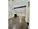 Spacious living room with high ceilings and fireplace at 5432 Post Road Pass, Stone Mountain, GA 30088