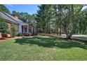 Brick home with covered porch and large yard at 45 Latimer Nw Ln, Cartersville, GA 30121