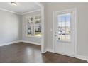 Bright entryway with hardwood floors and window at 6067 Ruby Falls, Stonecrest, GA 30038