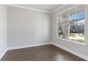 Spacious home office with hardwood floors and large window offering natural light at 6103 Ruby Falls, Stonecrest, GA 30038