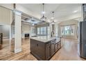 Island kitchen with granite countertops and stainless steel appliances at 631 Mabry Rd, Sandy Springs, GA 30328