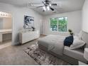 Spacious bedroom with neutral decor and en-suite bathroom at 6531 Arbor Gate Sw Dr # 12, Mableton, GA 30126