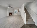 Living room with fireplace and stairs to the second floor at 6531 Arbor Gate Sw Dr # 12, Mableton, GA 30126