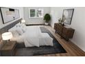 Spacious bedroom with hardwood floors, large windows, and ample natural light at 6520 Roswell Rd # 68, Atlanta, GA 30328