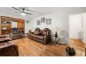 Living room with hardwood floors and comfy recliner chairs at 1433 Aniwaka Sw Ave, Atlanta, GA 30311