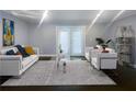 Spacious living room with French doors and stylish rug at 2492 Brentwood Ct, Decatur, GA 30032
