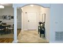 Bright entryway with hardwood floors and an arched doorway at 1735 Peachtree Ne St # 210, Atlanta, GA 30309