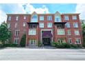 Brick building exterior with multiple windows and balconies at 1735 Peachtree Ne St # 210, Atlanta, GA 30309