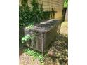 Metal cage covering an AC unit at 2159 Martin Luther King, Jr. Dr, Atlanta, GA 30310