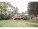 House with spacious deck and fenced backyard at 377 Mill Ridge Way, Lawrenceville, GA 30046