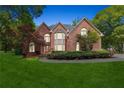 Brick home with lush green lawn at night at 21 Sherman Nw Ln, Cartersville, GA 30121