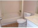 Clean bathroom with a bathtub, toilet and sink at 1038 Ascot Ct, Riverdale, GA 30296