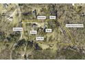 6.27-acre property with a home, shop, kennels and creek at 3651 Chandler Haulk Rd, Loganville, GA 30052