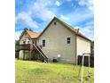 House back with deck, stairs, and yard at 6561 Harrington Pl, Douglasville, GA 30135