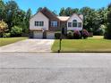 Ranch home with two-car garage and large yard at 6561 Harrington Pl, Douglasville, GA 30135