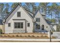 Luxury two-story home with stone and brick exterior at 4215 Tattnall Run, Acworth, GA 30101