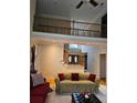 Spacious living room with high ceilings and a view of the second floor at 9904 Hamilton Dr, Douglasville, GA 30135