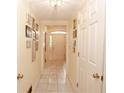 Light-filled hallway with tiled floors and coat closet at 3081 Howell Mill Nw Rd # 3, Atlanta, GA 30327