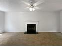 Spacious living room featuring a fireplace and neutral carpeting at 2110 Glenwood Downs Dr, Decatur, GA 30035