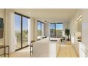 Open concept kitchen with island and access to patio at 318 Sandy Springs Cir # 270, Sandy Springs, GA 30328