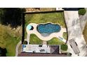 Freeform pool with large deck and fenced backyard at 3060 Habersham Cir, Covington, GA 30014