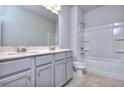 Clean bathroom featuring double vanity and a shower/tub combo at 6124 Ripple Way # 45, South Fulton, GA 30349