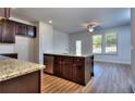 Modern kitchen with island and stainless steel appliances at 6120 Ripple Way # 46, South Fulton, GA 30349