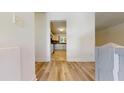Bright hallway with light flooring and view to kitchen at 5332 Zachary Dr, Stone Mountain, GA 30083