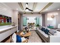 Gathering room with sliding glass doors leading to a backyard patio at 499 Godfrey Dr, Cumming, GA 30040