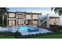 Luxury home featuring a large pool, outdoor kitchen, and patio at 5090 Derrick Rd, South Fulton, GA 30349