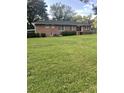 Brick ranch house with a large backyard at 4193 Dunmore Rd, Decatur, GA 30034