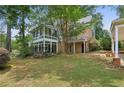 House exterior showcasing a side view and landscaping at 5622 Williamsburg Dr, Norcross, GA 30093