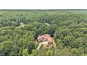 Luxury home nestled in a wooded area at 1608 Golden Creek Sw Ct, Conyers, GA 30094
