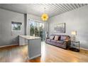Open living space with a granite countertop and balcony access at 620 Glen Iris Ne Dr # 205, Atlanta, GA 30308