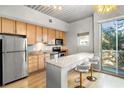 Modern kitchen with granite countertops and stainless steel appliances at 620 Glen Iris Ne Dr # 205, Atlanta, GA 30308