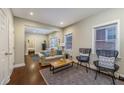 Living room with hardwood floors and comfortable seating at 604 Glen Iris Ne Dr, Atlanta, GA 30308