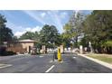 Gated community entrance with security access at 4701 Flat Shoals Rd # 68D, Union City, GA 30291