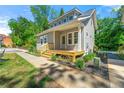 House exterior showcasing front porch and landscaping at 206 Commerce Dr, Decatur, GA 30030