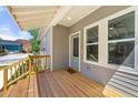 Inviting front porch with wooden deck and railing at 206 Commerce Dr, Decatur, GA 30030